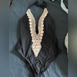 Never worn black one piece size M
